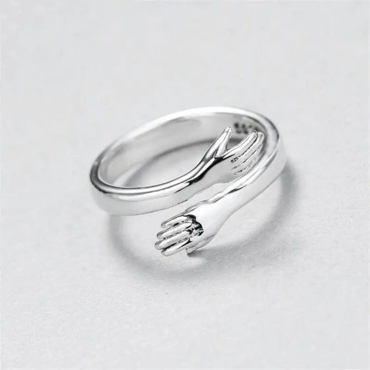 SILVER ADJUSTABLE HUG RING